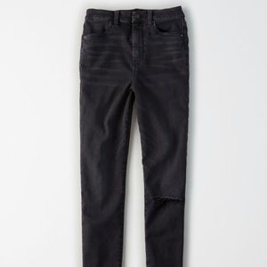 Black AEO jeans with one rip